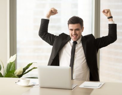 cybersecurity professional celebrating in joy, he got his job through effective job description