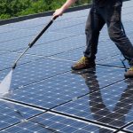 How Regular Pressure Washing Enhances Solar Panel Efficiency on Commercial Roofs